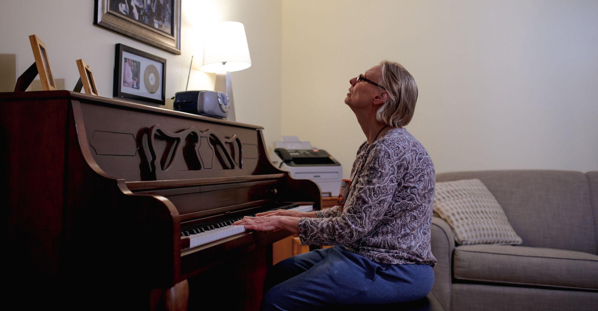 Image of man playing piano