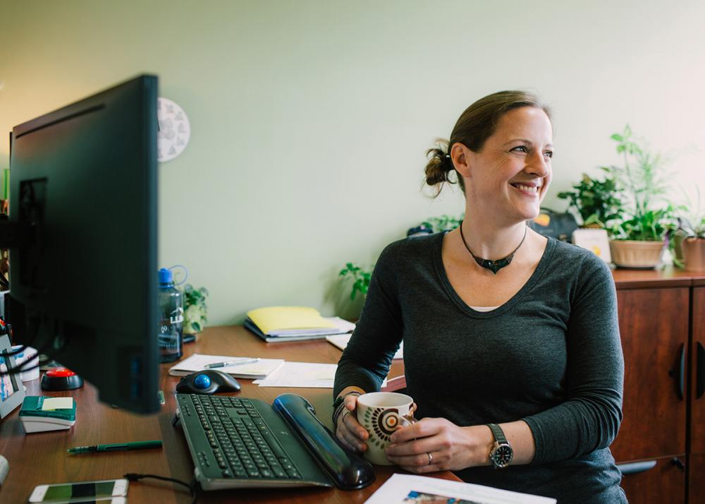 Melissa at her desk