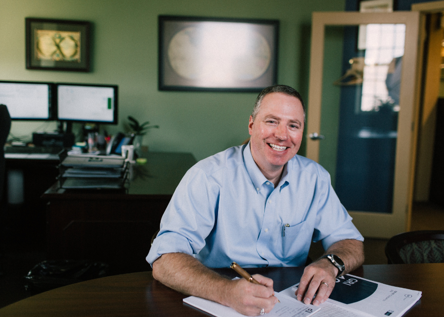 Image of Kent at his desk