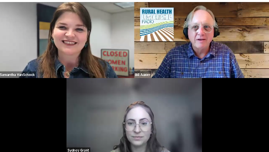Screenshot of Sam appearing on the Rural Health Podcast. There are three individuals on the Zoom call, Samantha in the top left smiling with long brown hair, to the right of her is Bill the host, an older male with glasses, and below the two of them is another female with glasses and longer brown hair